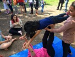 Children do acrobatics at Kanaf Sudbury School in Eliad, Israel